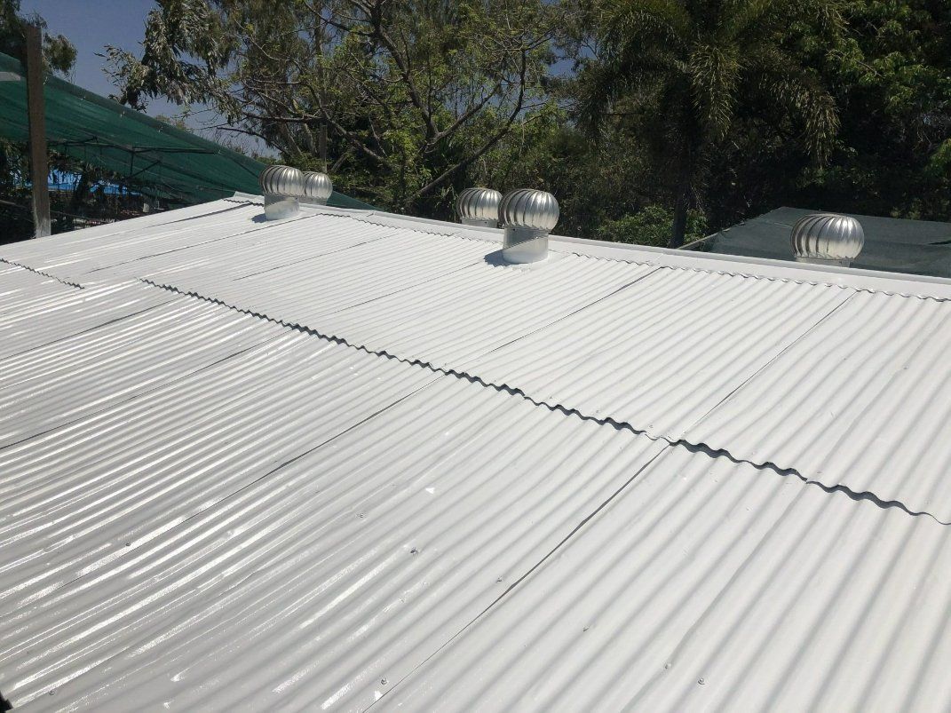 Freshly painted roof by North West Queensland Painting