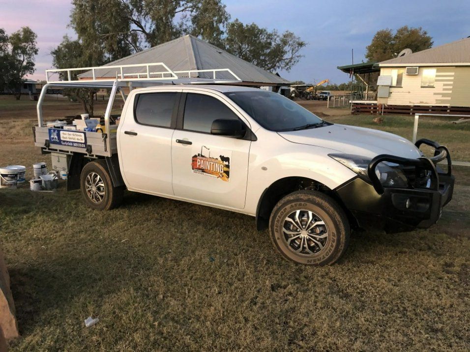 North West Queensland Painting vehicle on a rural road